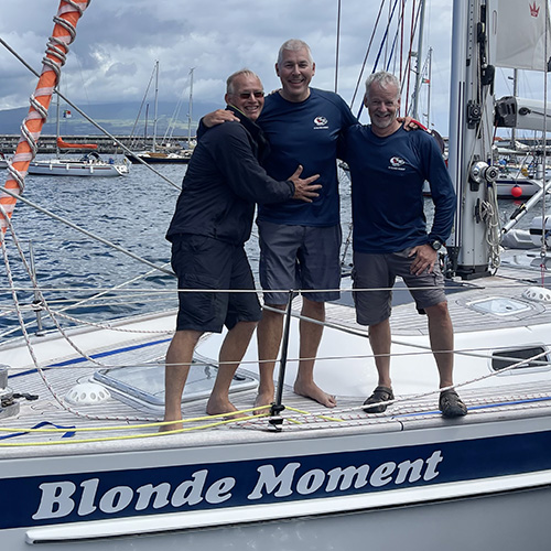 Paul Wade and the crew of Blonde Moment celebrate arriving in the Azores