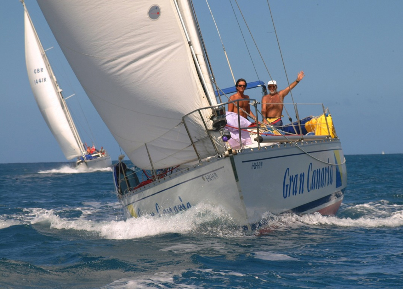 Yacht Canarias crosses the ARC '00 finish line in Saint Lucia