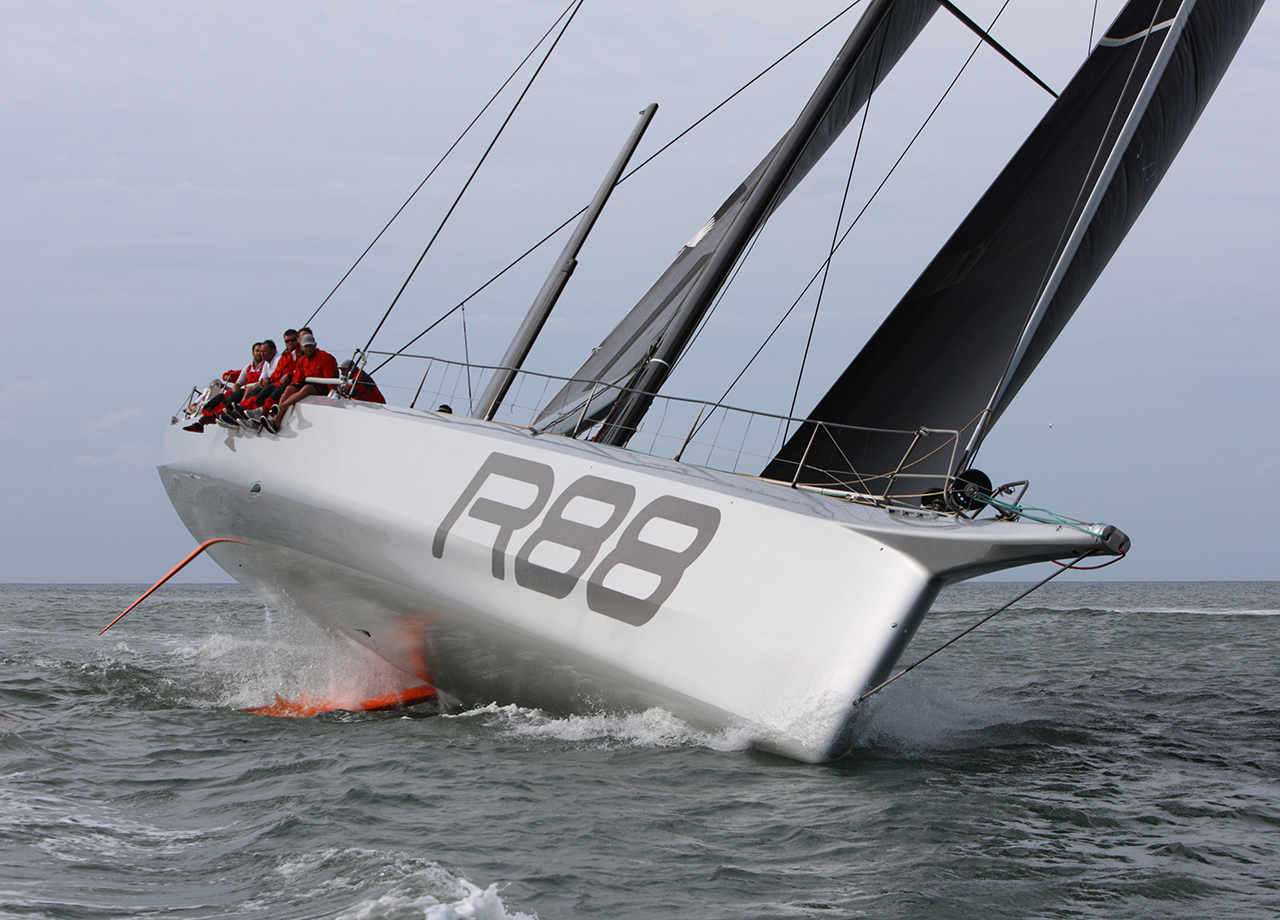 Silver maxi yacht Rambler 88 powers in to the ARC 2016 finish line in Rodney Bay, Saint Lucia