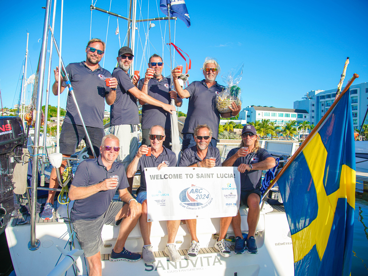 The crew of Swedish yacht Sandvita drinking rum punch on arrival in Saint Lucia after ARC 2024