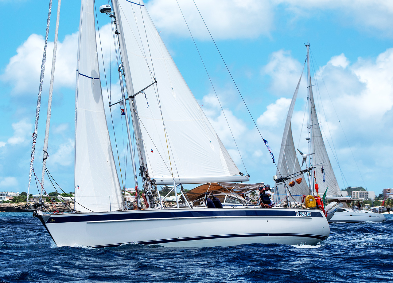 Italian Hallberg Rassy yacht Aleide powers away from Sint Maarten at the start of ARC Europe 2025