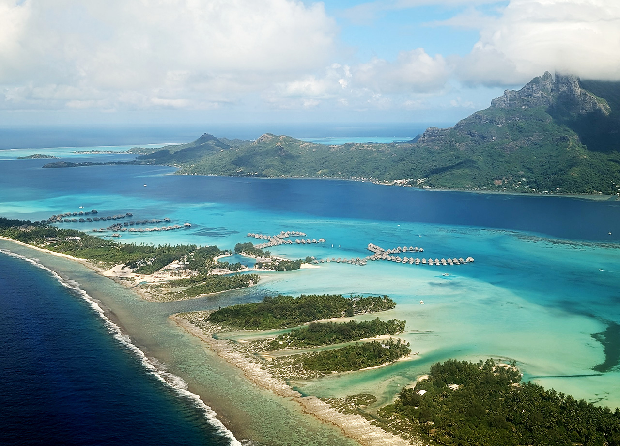 Aerial view of the Bora Bora reef and lagoon in French Polynesia